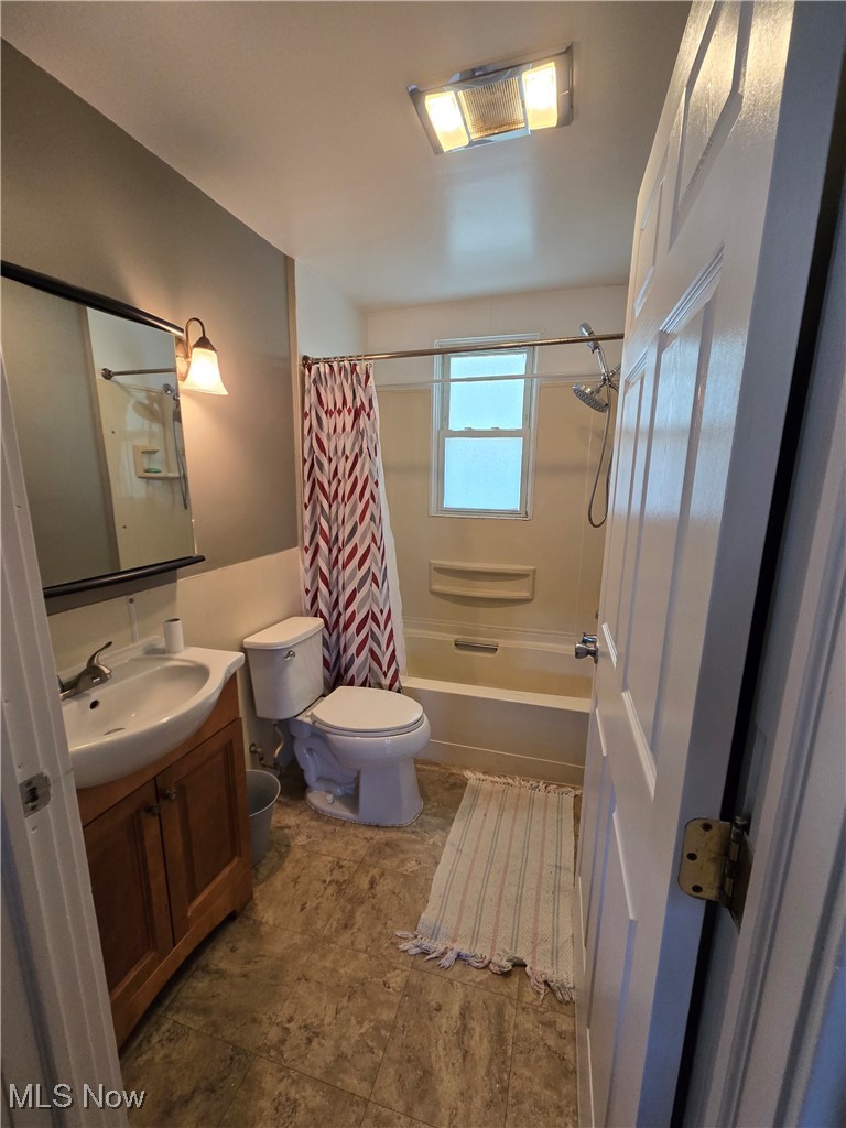 5555 Detroit Road Sheffield, OH 44054 - Photo 10 of 50 Bathroom featuring vanity and shower / bath combo