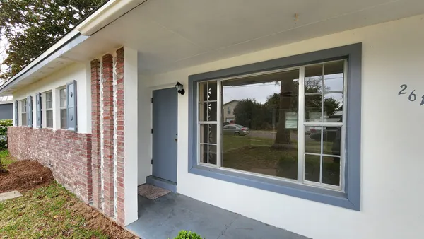 a view of a porch of a house