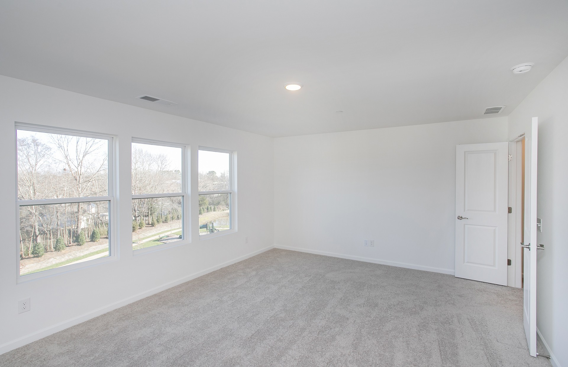 7129 Mapleside Lane Fairview, TN 37062 - Photo 12 of 49 a view of an empty room with a window