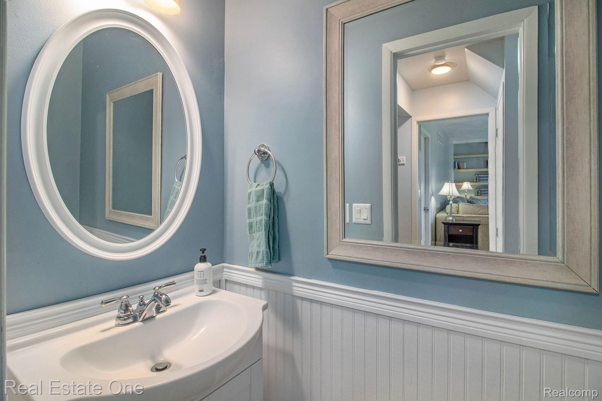 1296 Barneswood Lane Rochester, MI 48306 - Photo 12 of 32 Half Bath / Lavatory conveniently located between kitchen and Living Room with easy access from any place on the main level