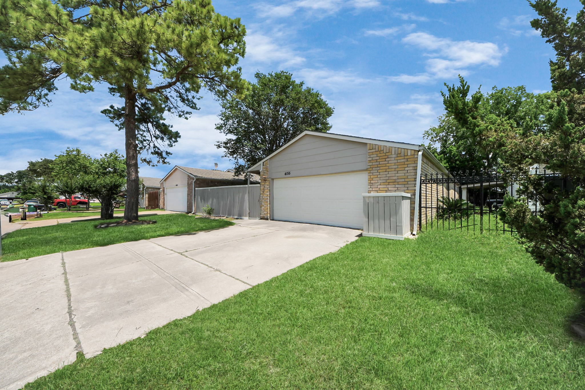 4155 Amir Street Houston, TX 77072 - Photo 5 of 43 a front view of house with yard and green space