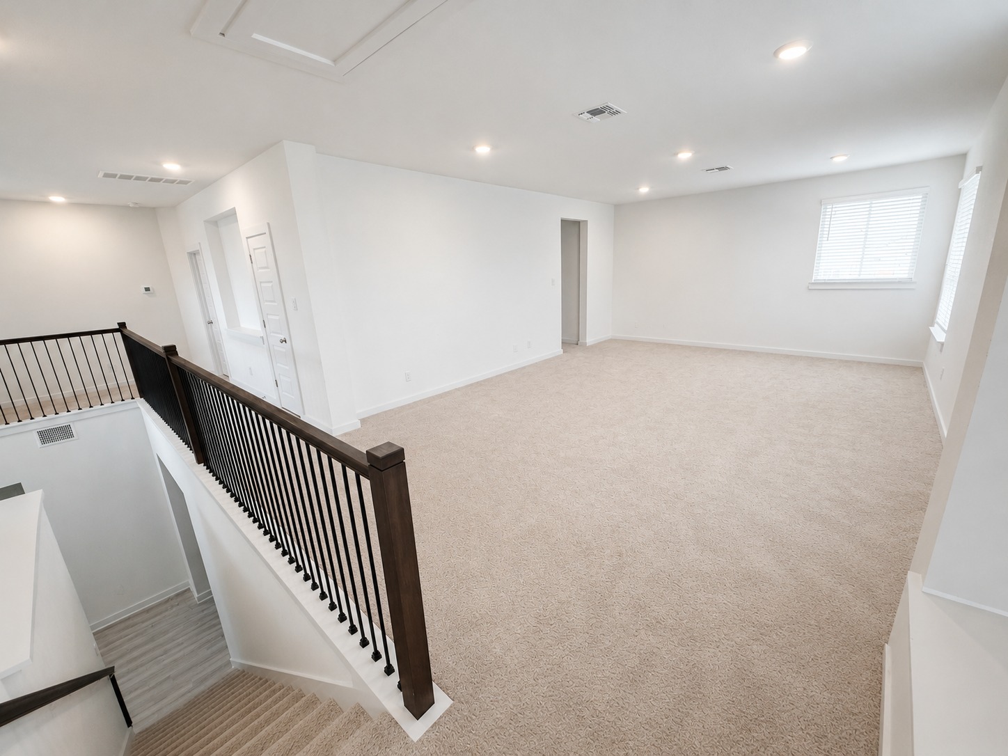 1213 Bryson Rdg Trail Leander, TX 78641 - Photo 8 of 16 A spacious upstairs living area provides ample room for relaxation and entertaining.