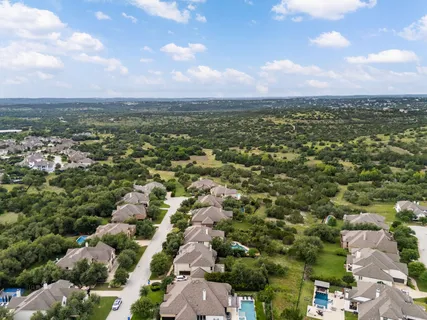 an aerial view of a city with lots of residential buildings