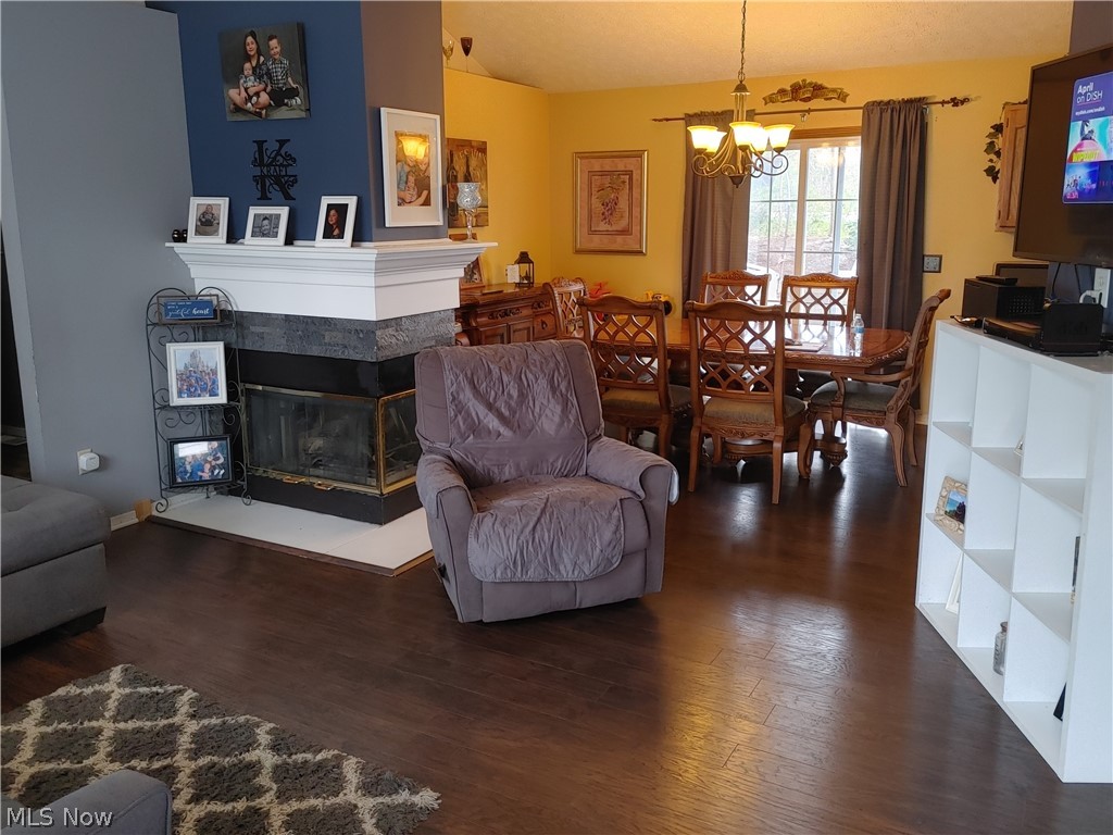 Living room open to the dining room - great vinyl floors throughout