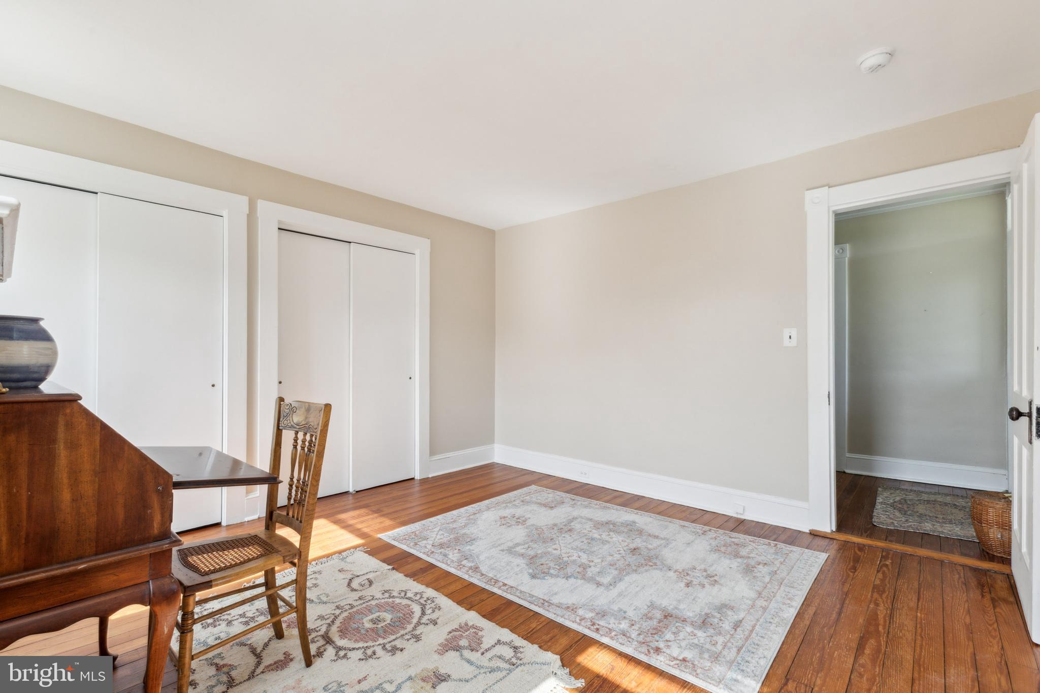 1095 Senseny Road Berryville, VA 22611 - Photo 16 of 47 a view of a livingroom with wooden floor and a rug