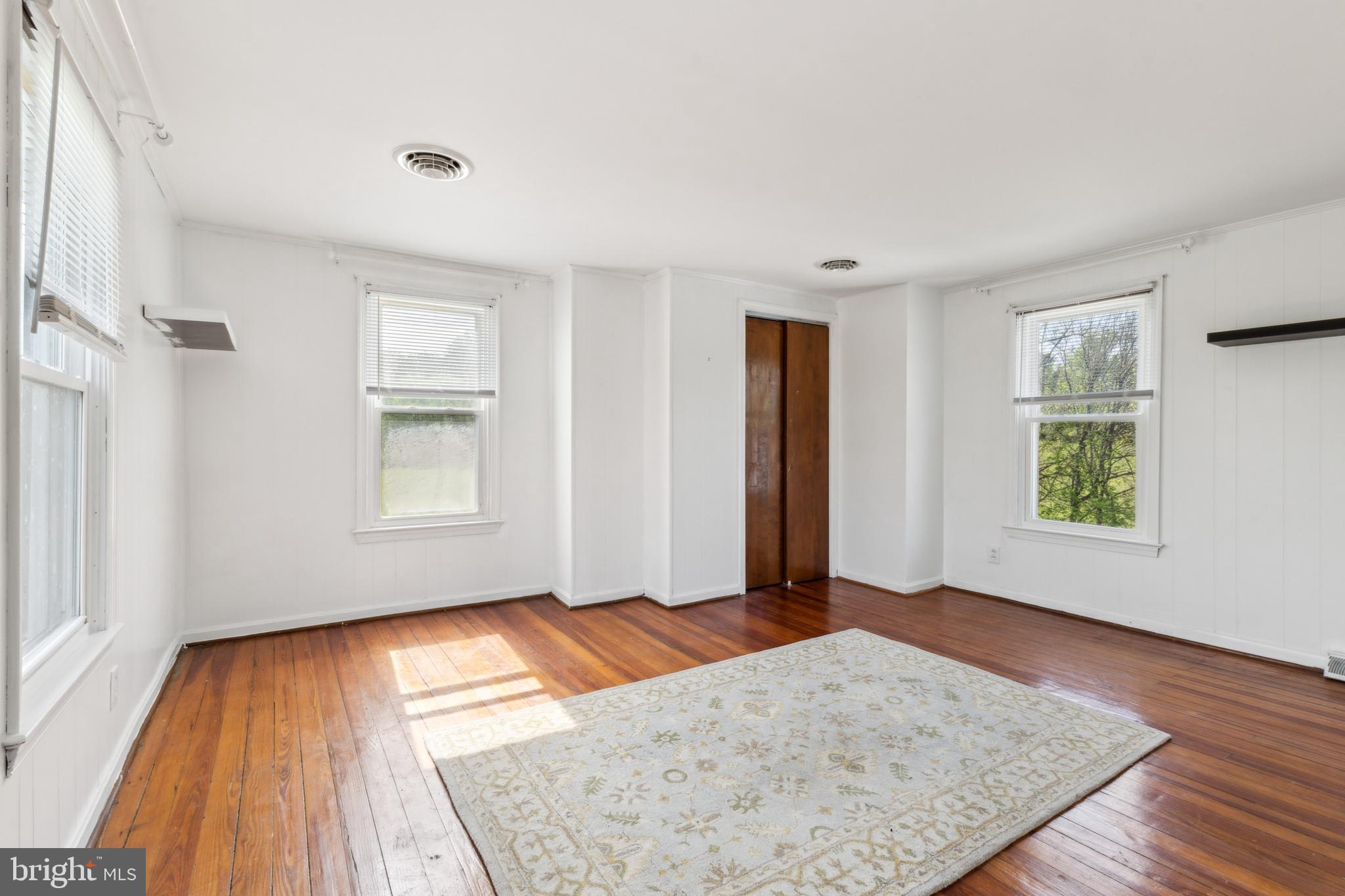 1095 Senseny Road Berryville, VA 22611 - Photo 28 of 47 an empty room with windows and closet