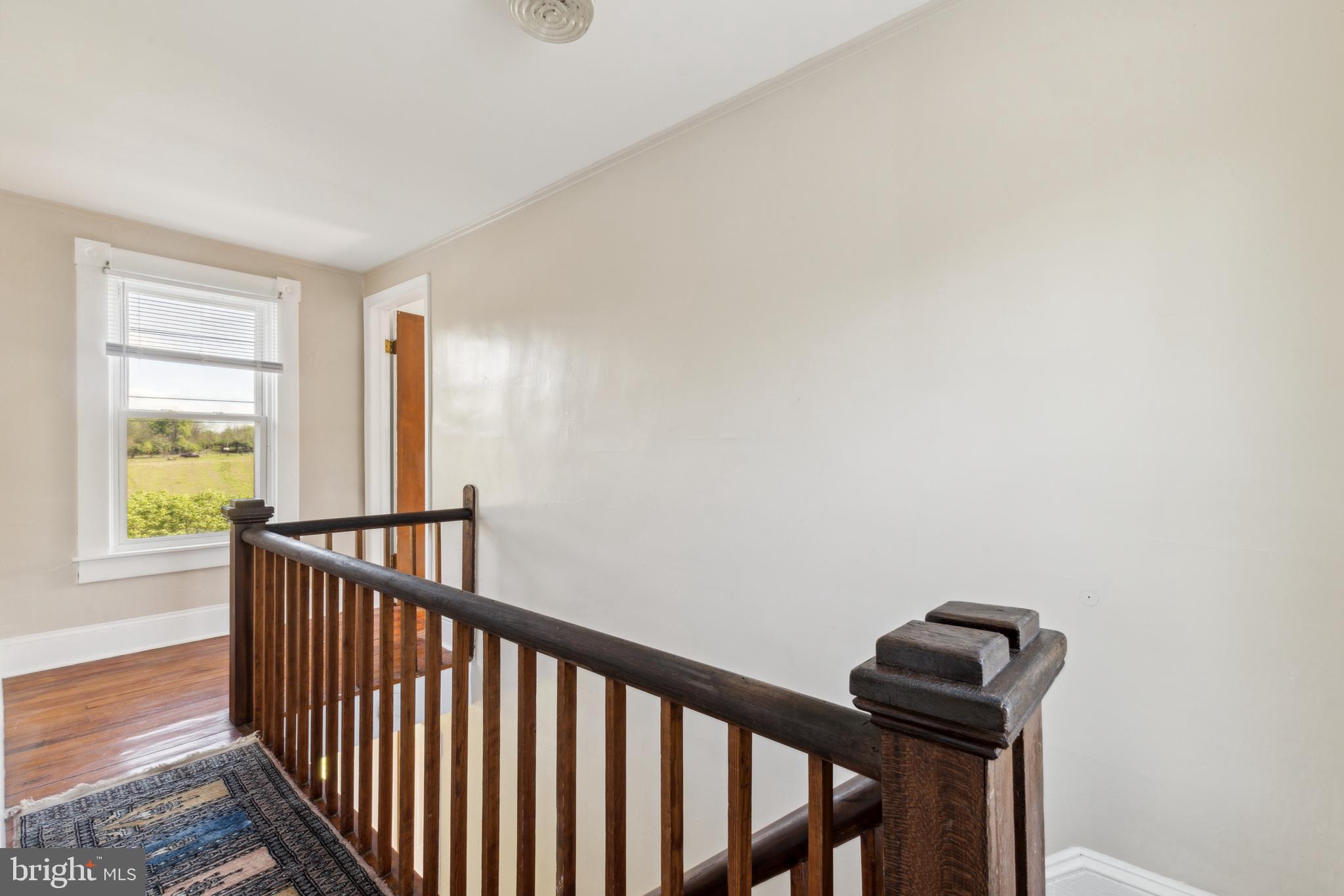 1095 Senseny Road Berryville, VA 22611 - Photo 31 of 47 a view of a hallway with windows