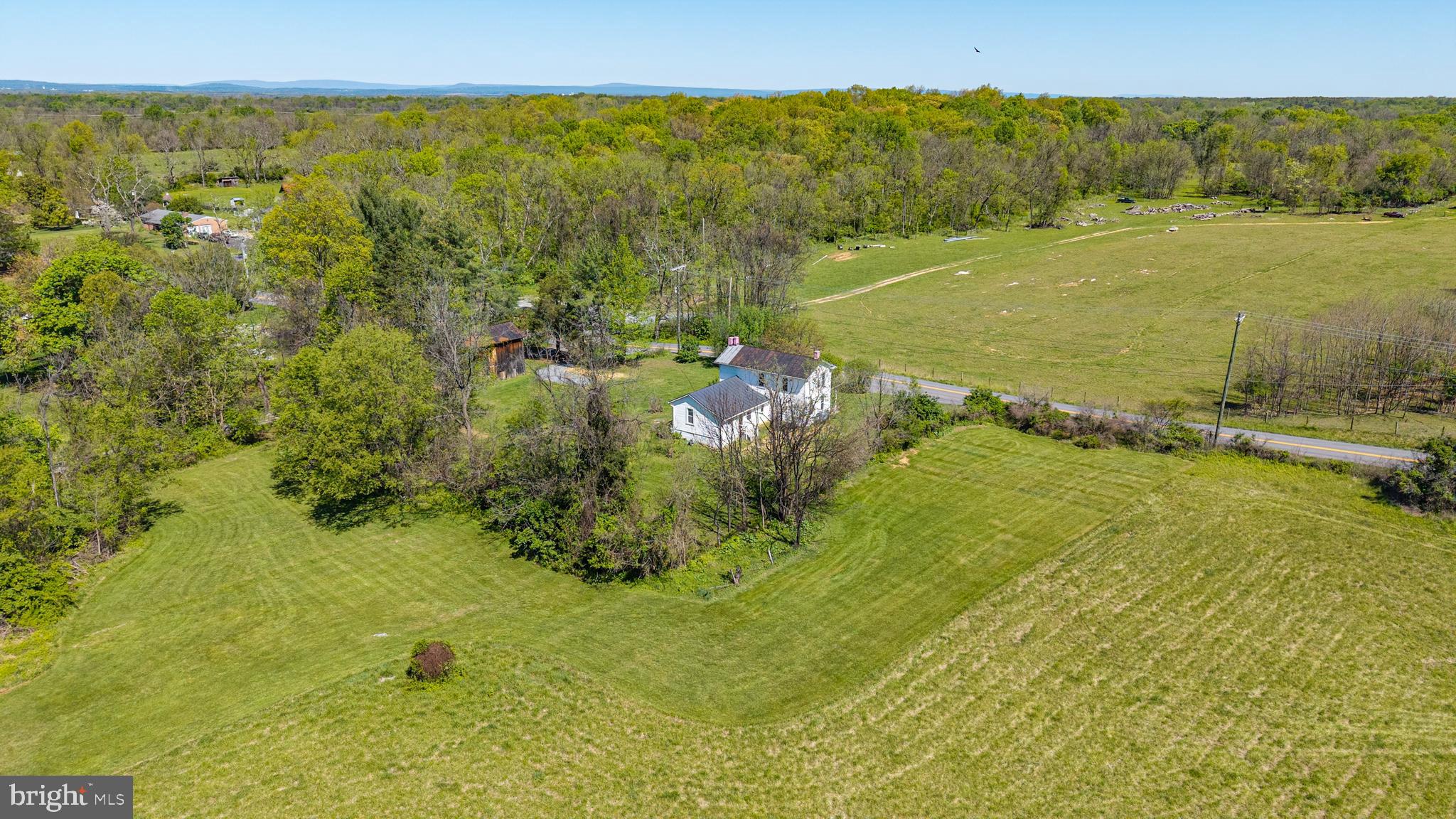1095 Senseny Road Berryville, VA 22611 - Photo 41 of 47 a view of a lake with a yard