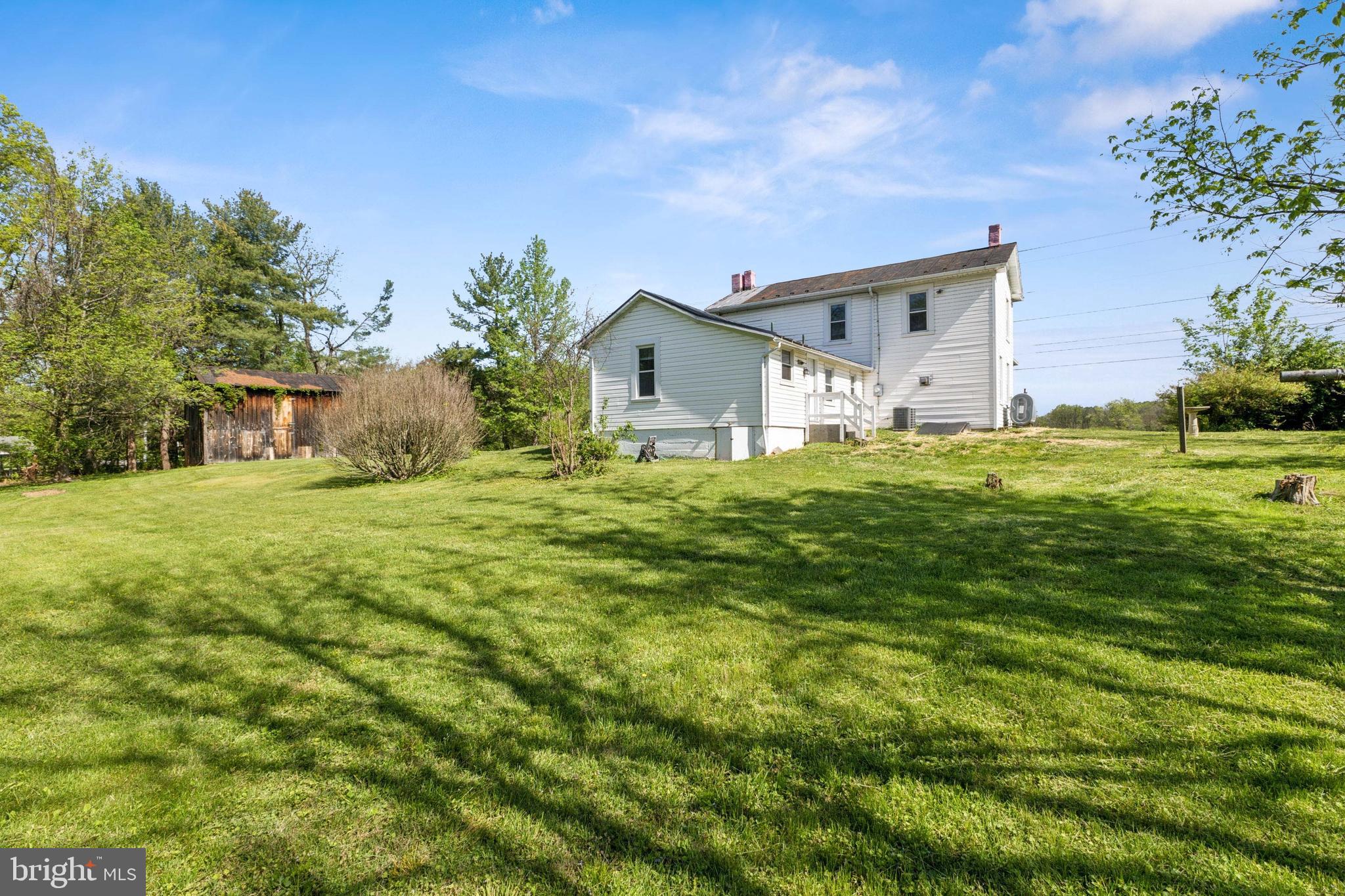 1095 Senseny Road Berryville, VA 22611 - Photo 47 of 47 a house view with a garden space