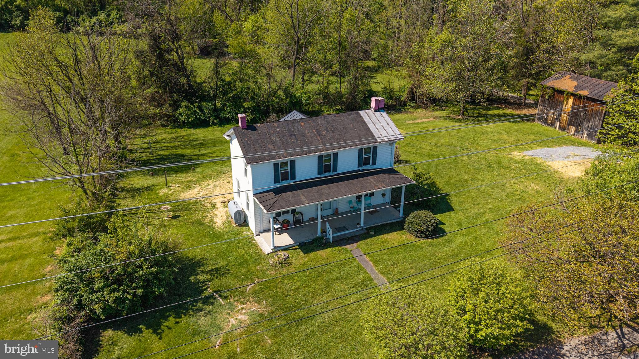 1095 Senseny Road Berryville, VA 22611 - Photo 7 of 47 a view of a house with a yard