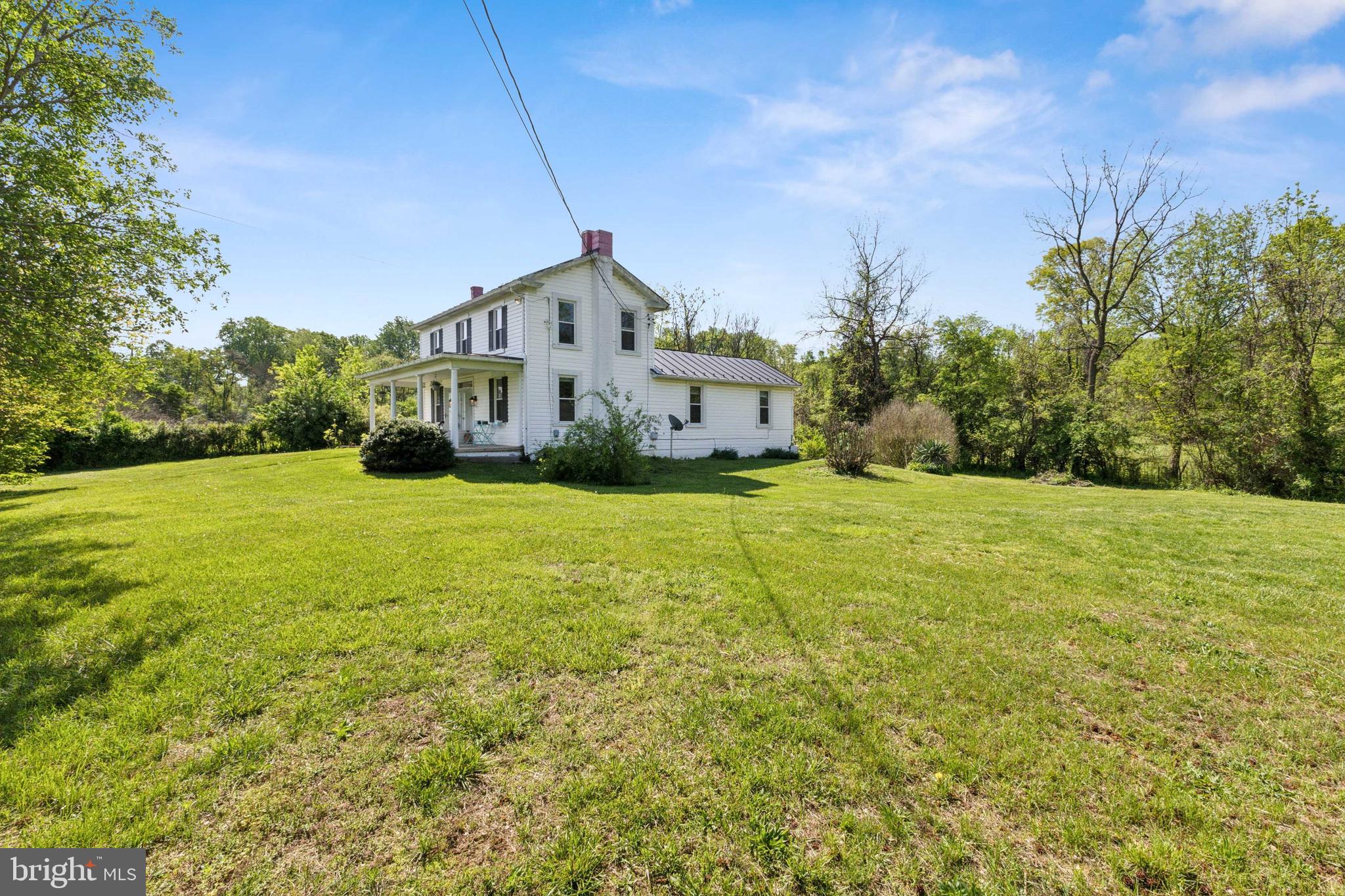 1095 Senseny Road Berryville, VA 22611 - Photo 9 of 47 a front view of a house with yard