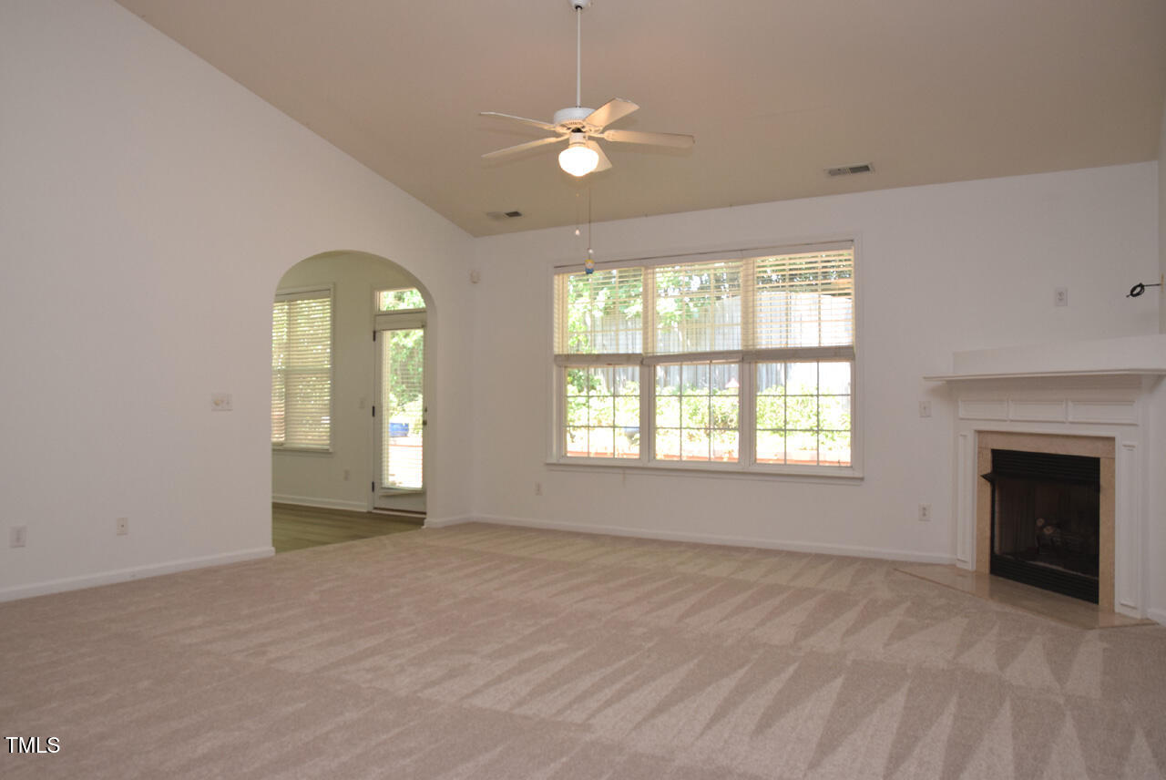 10461 Dapping Drive Raleigh, NC 27614 - Photo 10 of 29 a view of an empty room with a window
