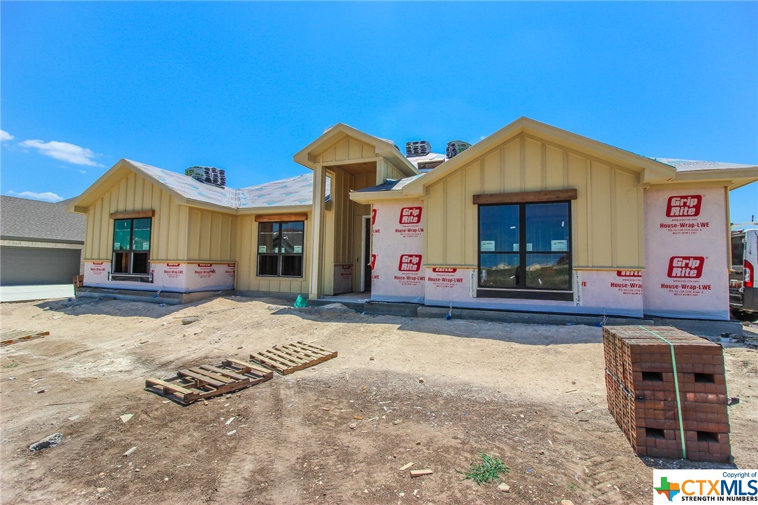 a front view of a house with yard