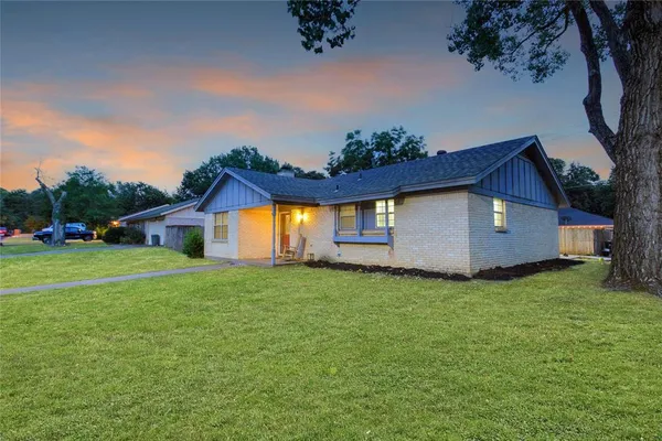 a house view with a garden space