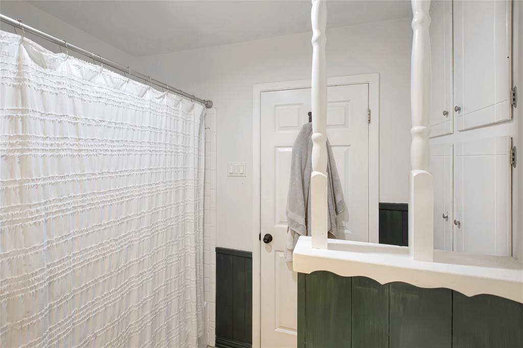 853 Royal Terrace Hurst, TX 76053 - Photo 12 of 34 a bathroom with a sink and a mirror