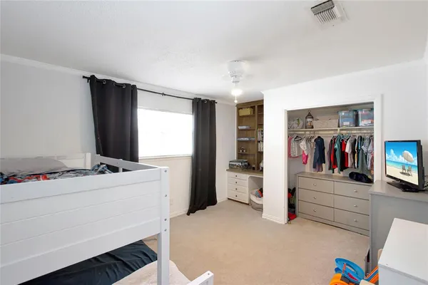 a room with toys and dresser