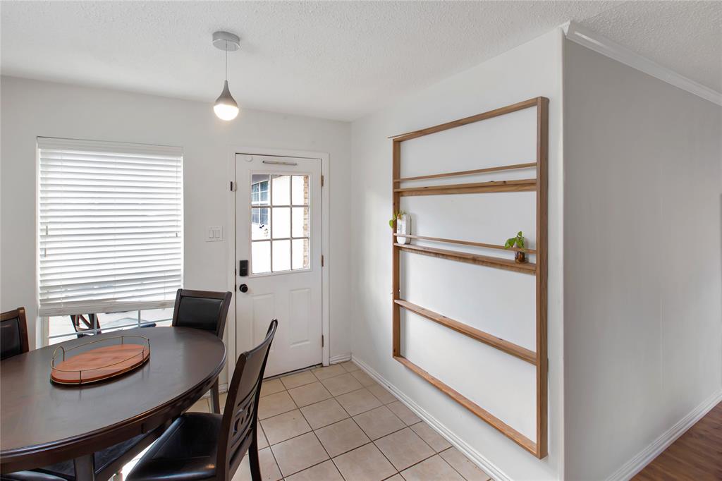 853 Royal Terrace Hurst, TX 76053 - Photo 9 of 34 a room with furniture and window