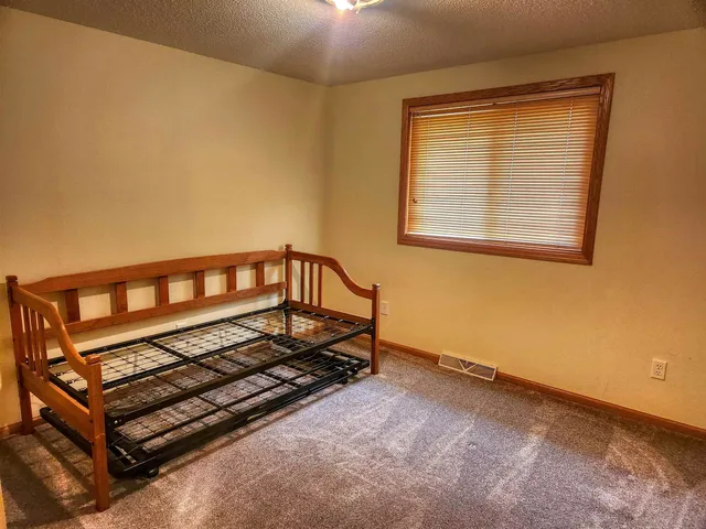 a bedroom with bunk bed