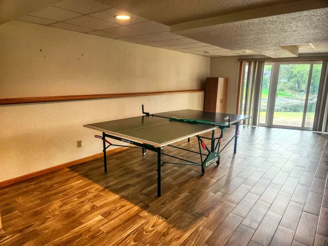 a living room with wooden floor