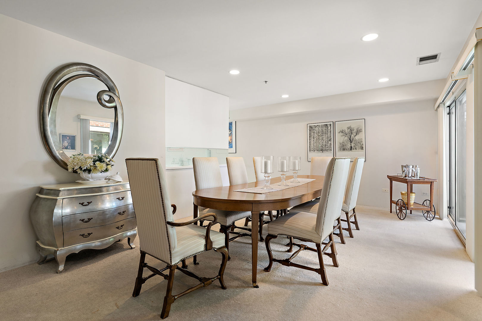 392 Kelburn Road, Unit 122 Deerfield, IL 60015 - Photo 6 of 22 a view of a dining room with furniture and a chandelier