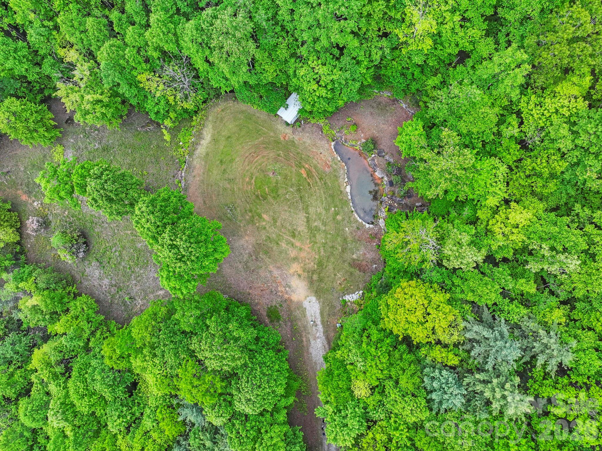 1325 Golden Road Lake Toxaway, NC 28747 - Photo 7 of 15 an aerial view of a residential houses with outdoor space and trees all around
