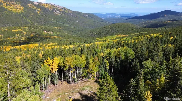 a view of a lake with mountains in the background