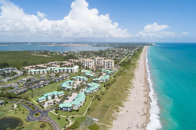 a view of a lake with a yard