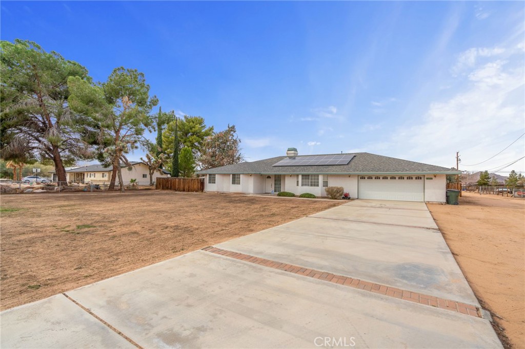 14330 Flathead Road Apple Valley, CA 92307 - Photo 1 of 1 a view of building with outdoor space