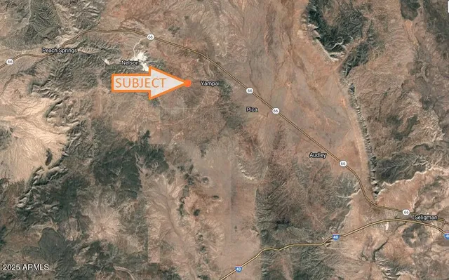 a street sign on a brick wall