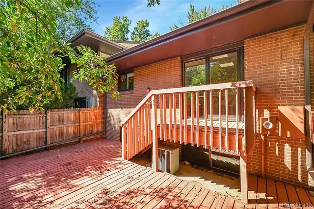 a view of outdoor space with deck and backyard