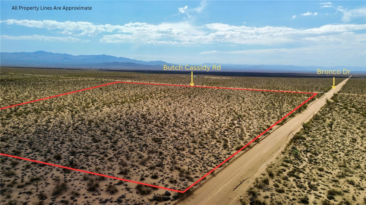 Parcel3177 South Butch Cassidy Road Yucca, AZ 86438 - Photo 2 of 9 View of rural area with property parcel outlined and a mountain backdrop
