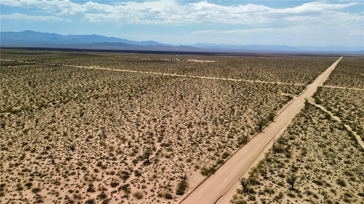 Parcel3177 South Butch Cassidy Road Yucca, AZ 86438 - Photo 7 of 9 View of rural area featuring mountains and a desert landscape