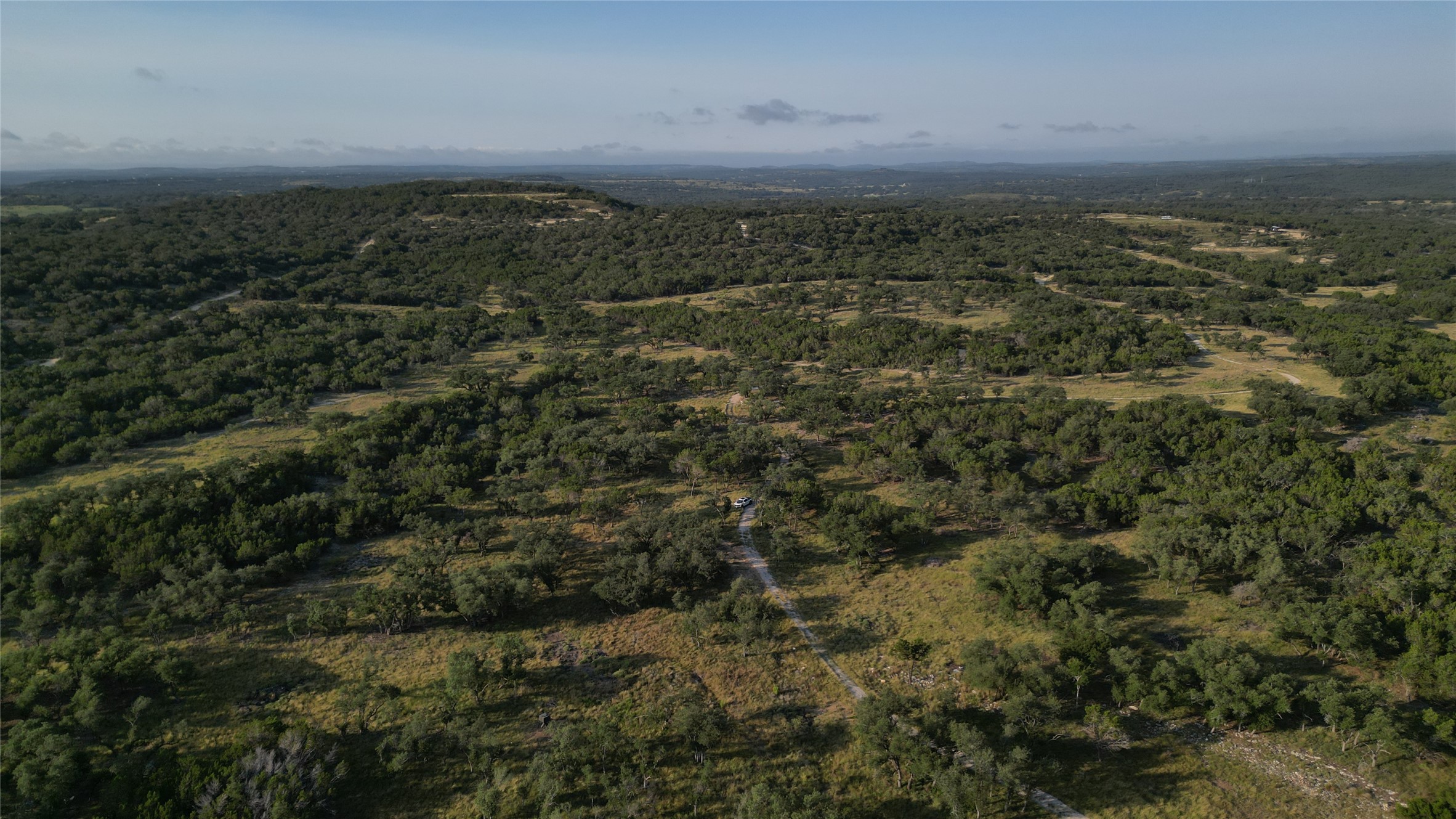 7819 Ranch To Market Road 2766 Ranch Johnson City, TX 78636 - Photo 16 of 30 an aerial view of residential house and green space