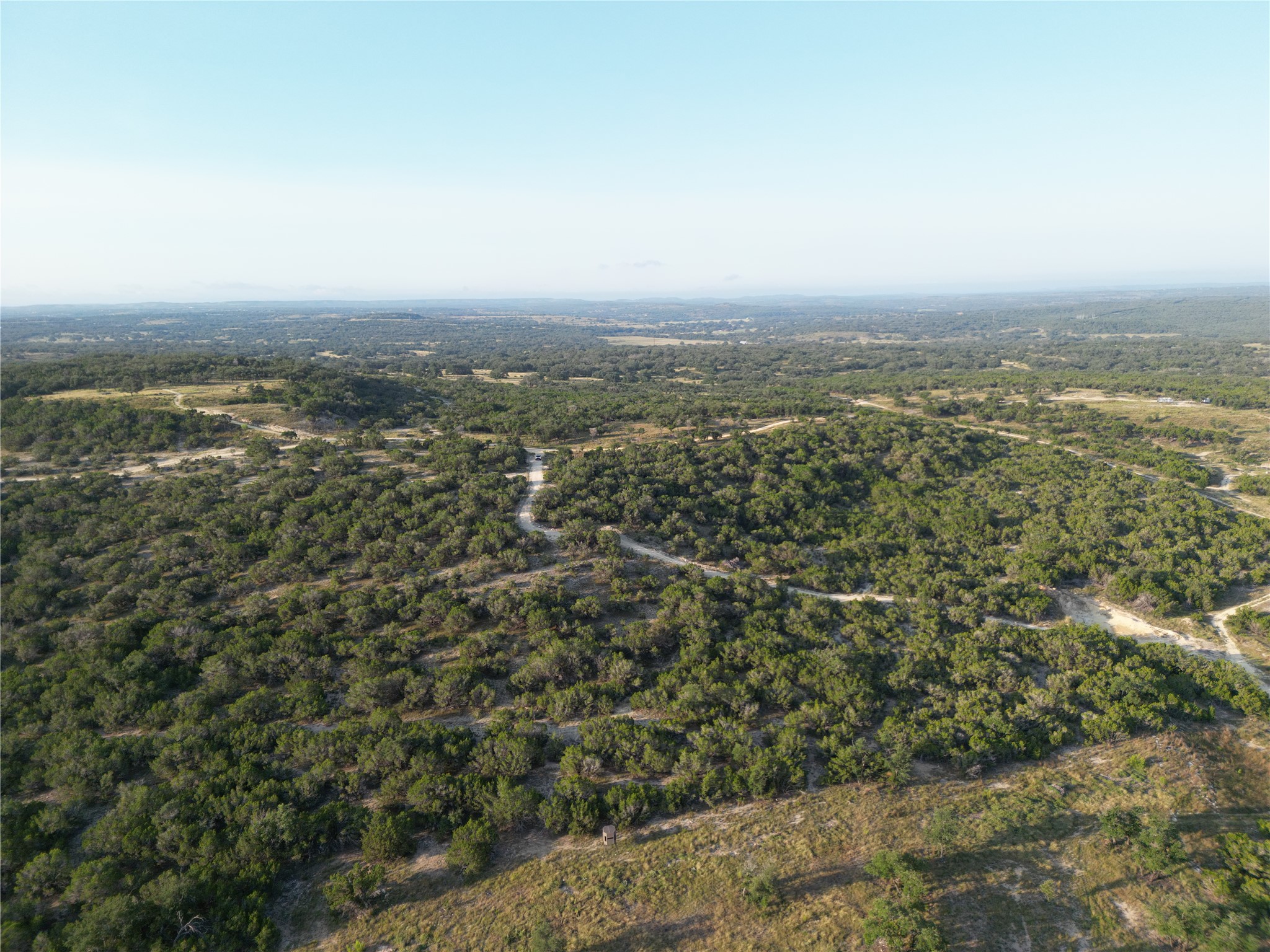 7819 Ranch To Market Road 2766 Ranch Johnson City, TX 78636 - Photo 22 of 30 an aerial view of residential house and green space
