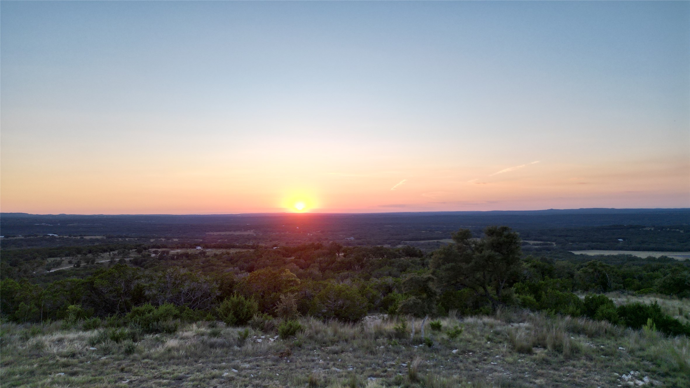 7819 Ranch To Market Road 2766 Ranch Johnson City, TX 78636 - Photo 25 of 30 a view of a city with lush green forest