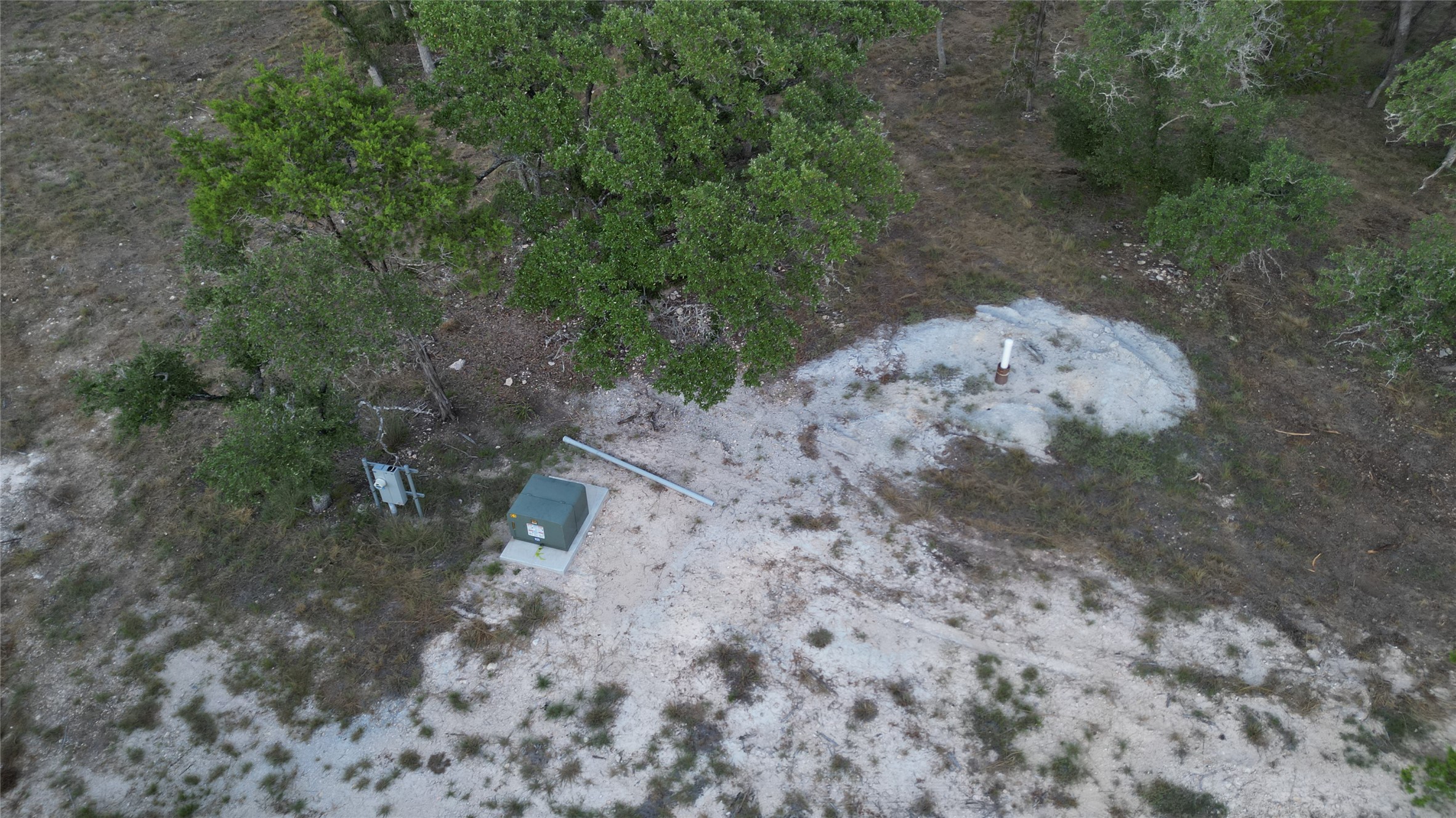 7819 Ranch To Market Road 2766 Ranch Johnson City, TX 78636 - Photo 27 of 30 a view of a dry yard with trees