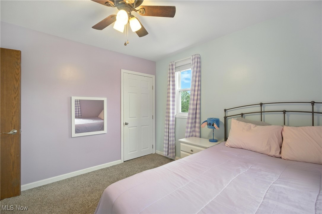 1371 Spider Ridge Road Parkersburg, WV 26104 - Photo 25 of 48 Carpeted bedroom featuring baseboards and ceiling fan