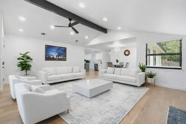 a bedroom with a bed a desk and chair