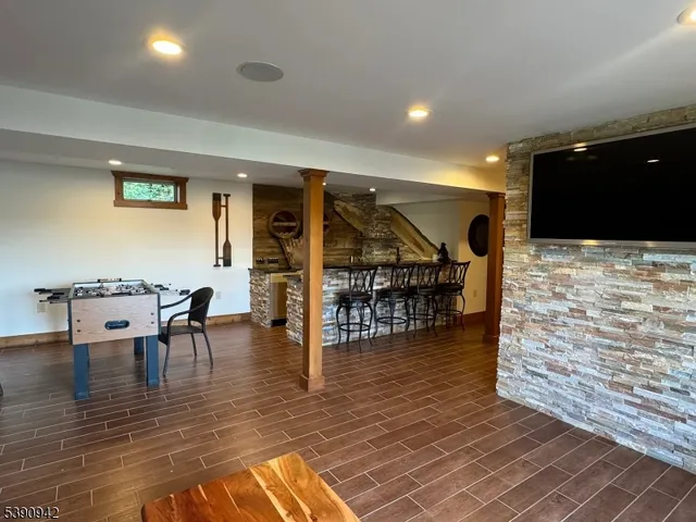a kitchen with a sink and a refrigerator