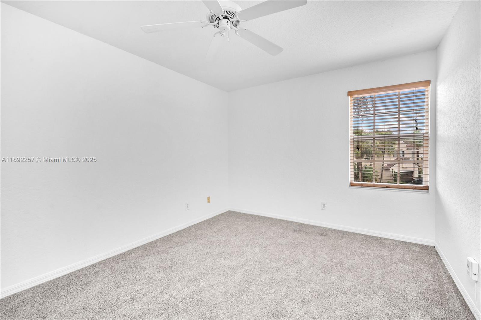 1637 Southwest 156th Avenue Pembroke Pines, FL 33027 - Photo 14 of 27 an empty room with a window