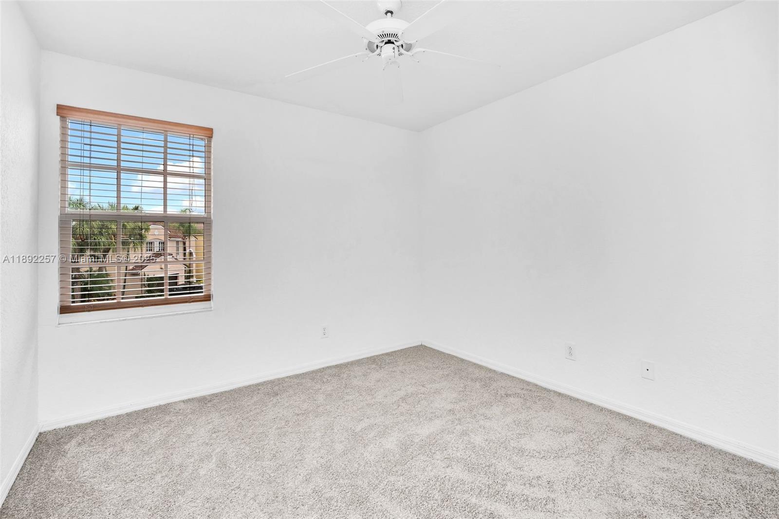 1637 Southwest 156th Avenue Pembroke Pines, FL 33027 - Photo 18 of 27 an empty room with a window