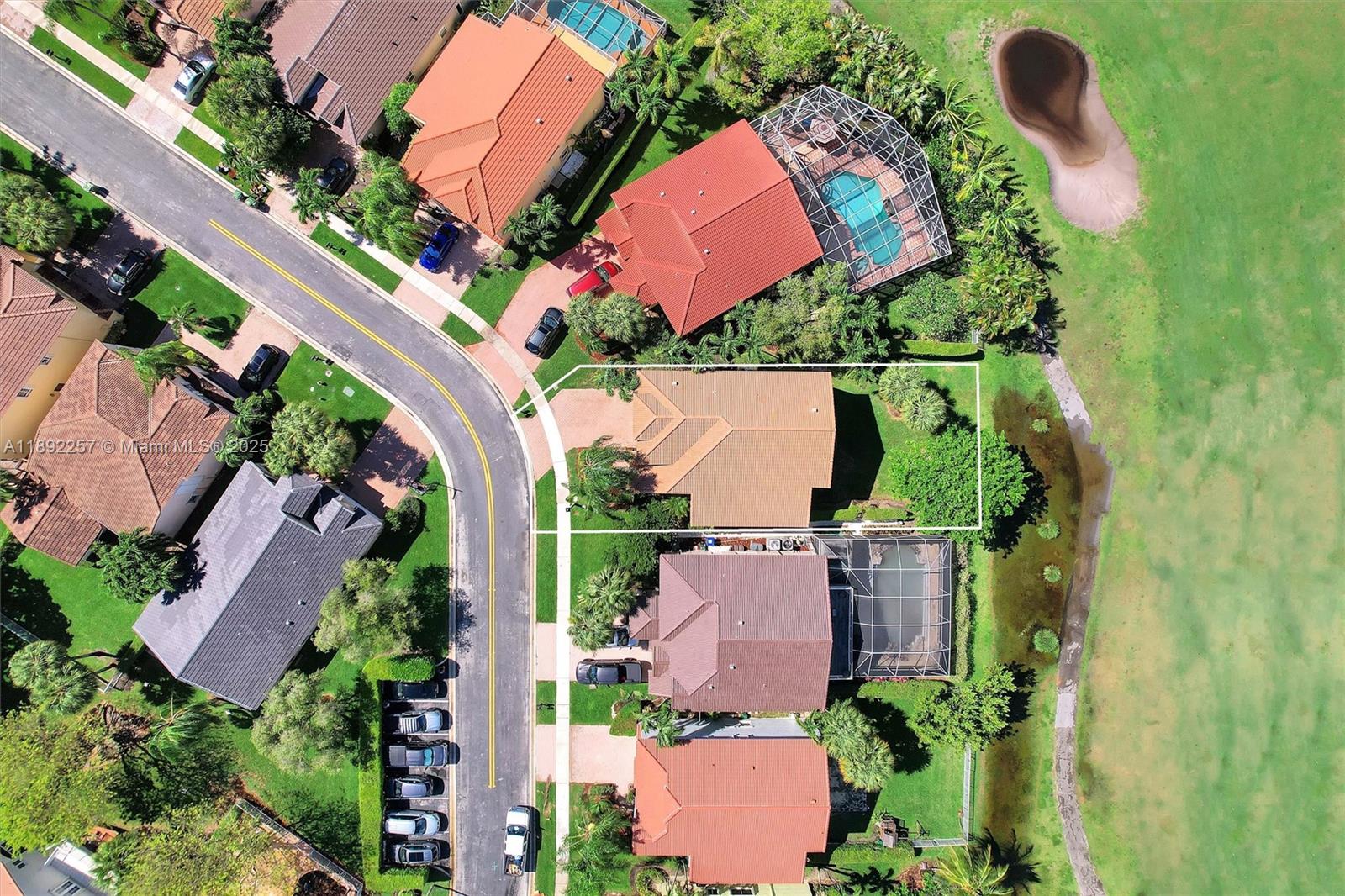 1637 Southwest 156th Avenue Pembroke Pines, FL 33027 - Photo 25 of 27 an aerial view of a house with a garden
