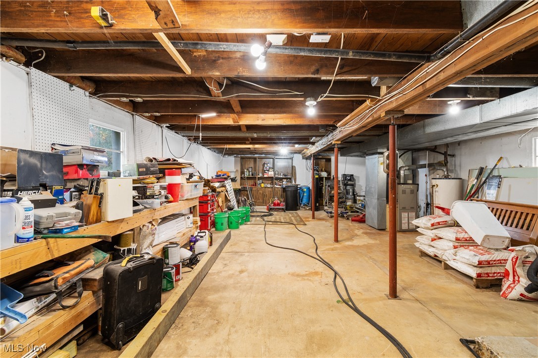 8177 South Cleveland Massillon Road, Unit 55 Clinton, OH 44216 - Photo 27 of 32 Basement with water heater