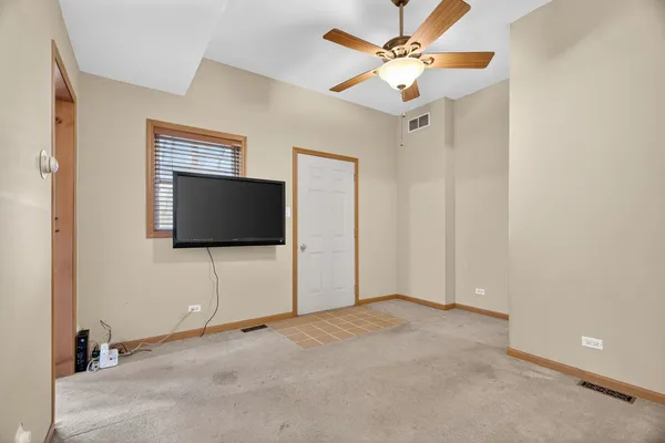 a view of a livingroom with a flat screen tv