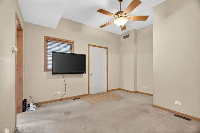 a view of a livingroom with a flat screen tv