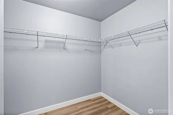 a view of a room with racks on the wall
