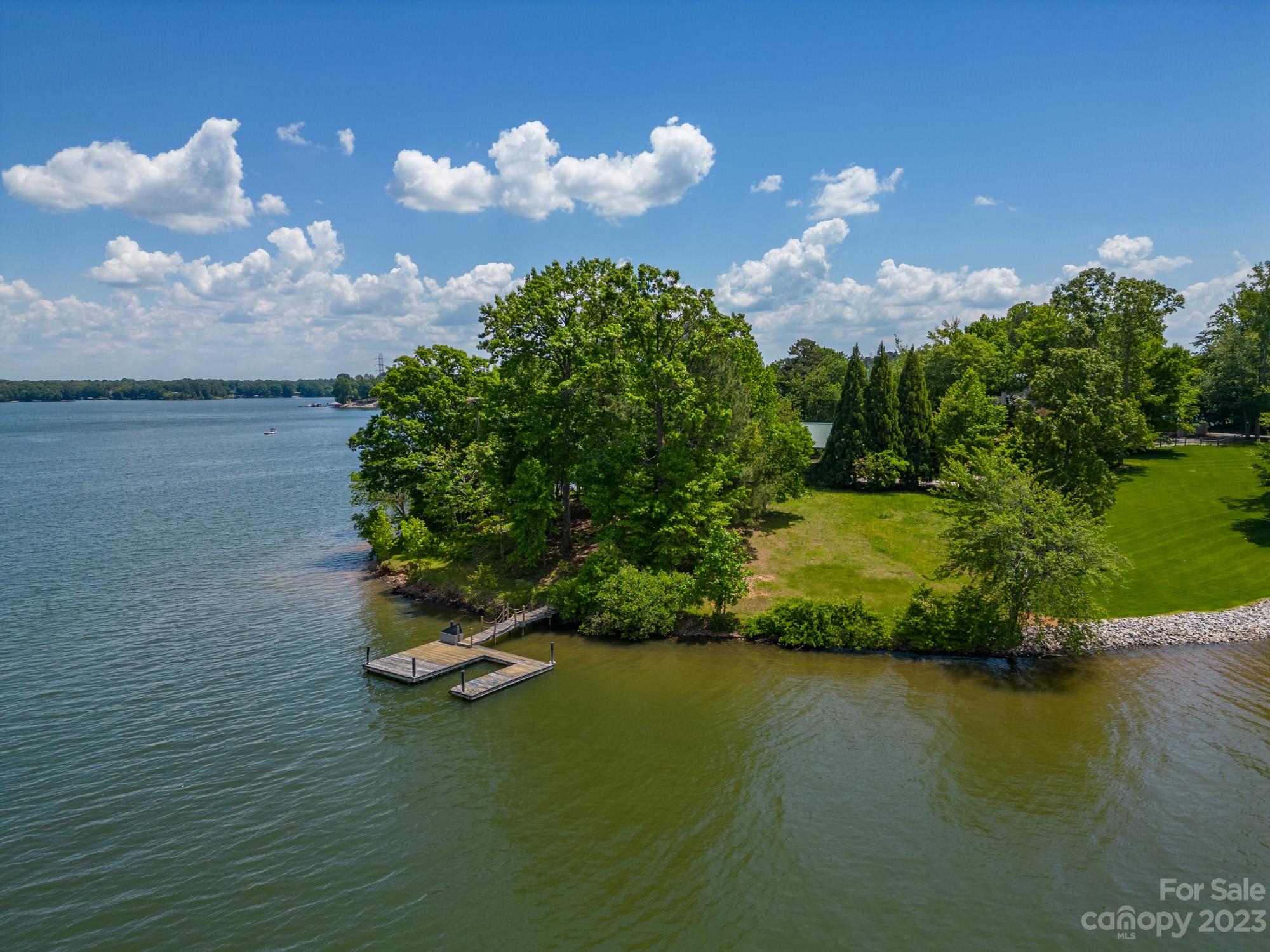 8989 Azalea Road Sherrills Ford, NC 28673 - Photo 8 of 11 a swimming pool with trees in the background