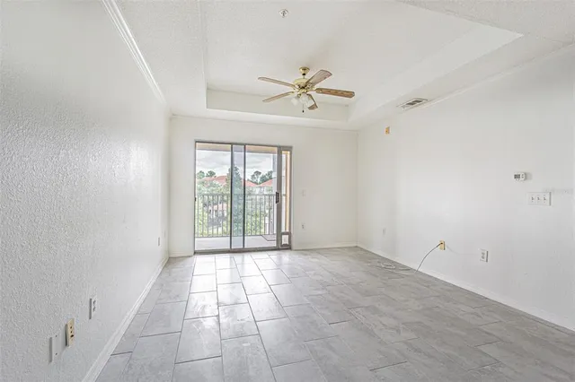 a view of a room with a large window