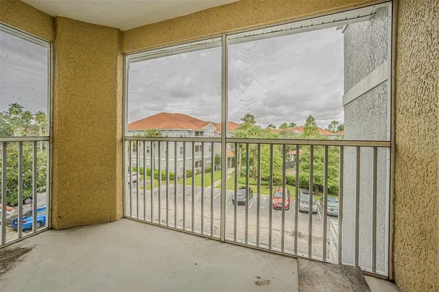 a white toilet and tub sitting next to a bathroom sink
