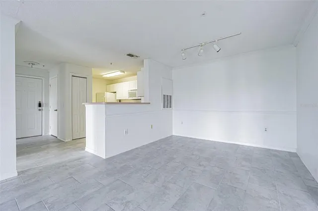 a bathroom with a granite countertop toilet a sink and a bathtub